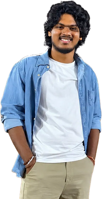 Portrait of Rithwik Bandi smiling, wearing a denim shirt over a white tee
